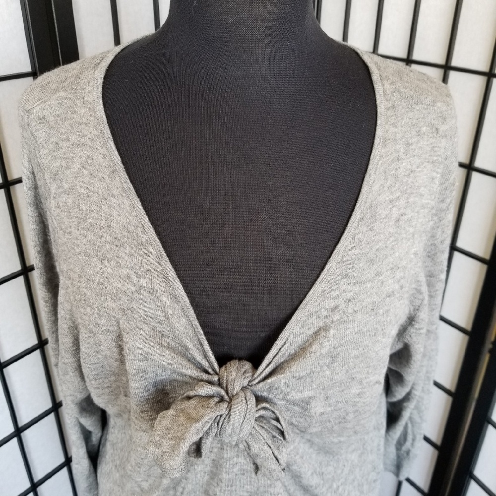 Sweater with tie up bow detail